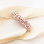 Spinka ślubna rose gold z listkami pięknie błyszczącymi cyrkoniami