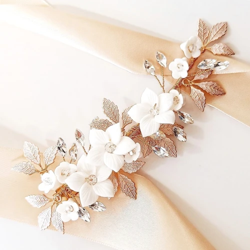 Efektowna złota spinka do włosów z kwiatami i cyrkoniami