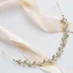 Opaska ślubna złota z listkami i cyrkoniami