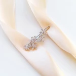 Srebrna spinka do włosów z kwiatuszkami z cyrkonii