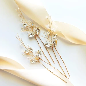 Zestaw trzech złotych ozdobnych szpilek z cyrkoniami i kryształkami