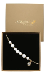 Efektowna złota perłowa bransoletka z zawieszką STELLA gold